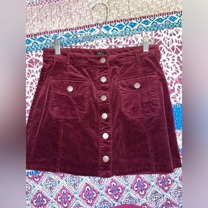 Maroon or burgundy skirt